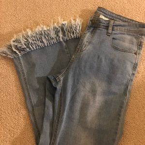 Beautiful light wash frilled hem jeans high waist